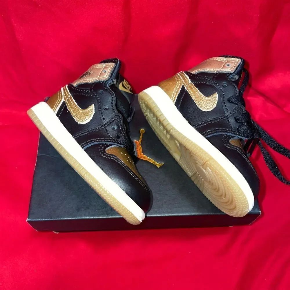 Jordan 1 Retro High Top Nike Black and Gold Sneakers
